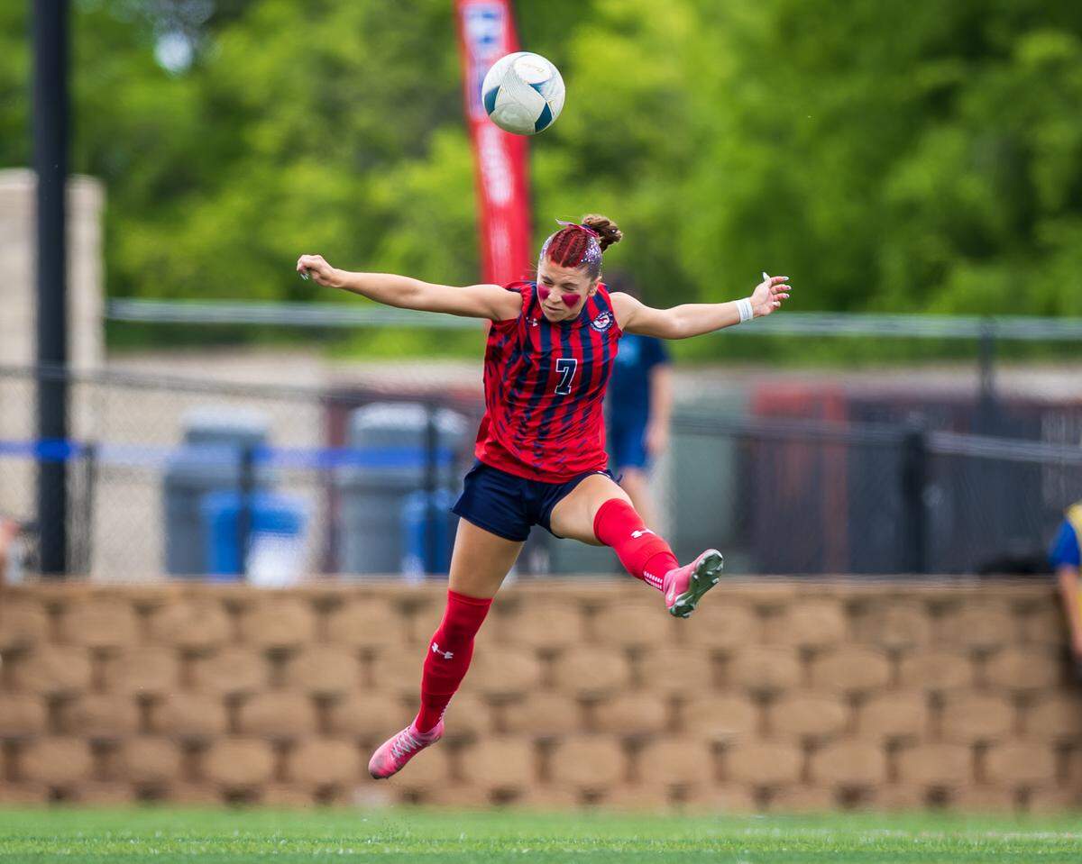 Grapevine’s Hope Harvill (7) advances the ball against Montgomery Lake Creek in the UIL Class 5A Division II state soccer championship game on Friday, April 10, 2026, at Birkelbach Field in Georgetown, Texas.