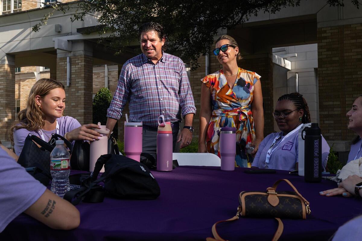 TCU Chancellor Daniel Pullin and wife Ann Bluntzer Pullin greet incoming freshman during a “Frog Camp” event on TCU’s campus on Friday, July 11, 2025.