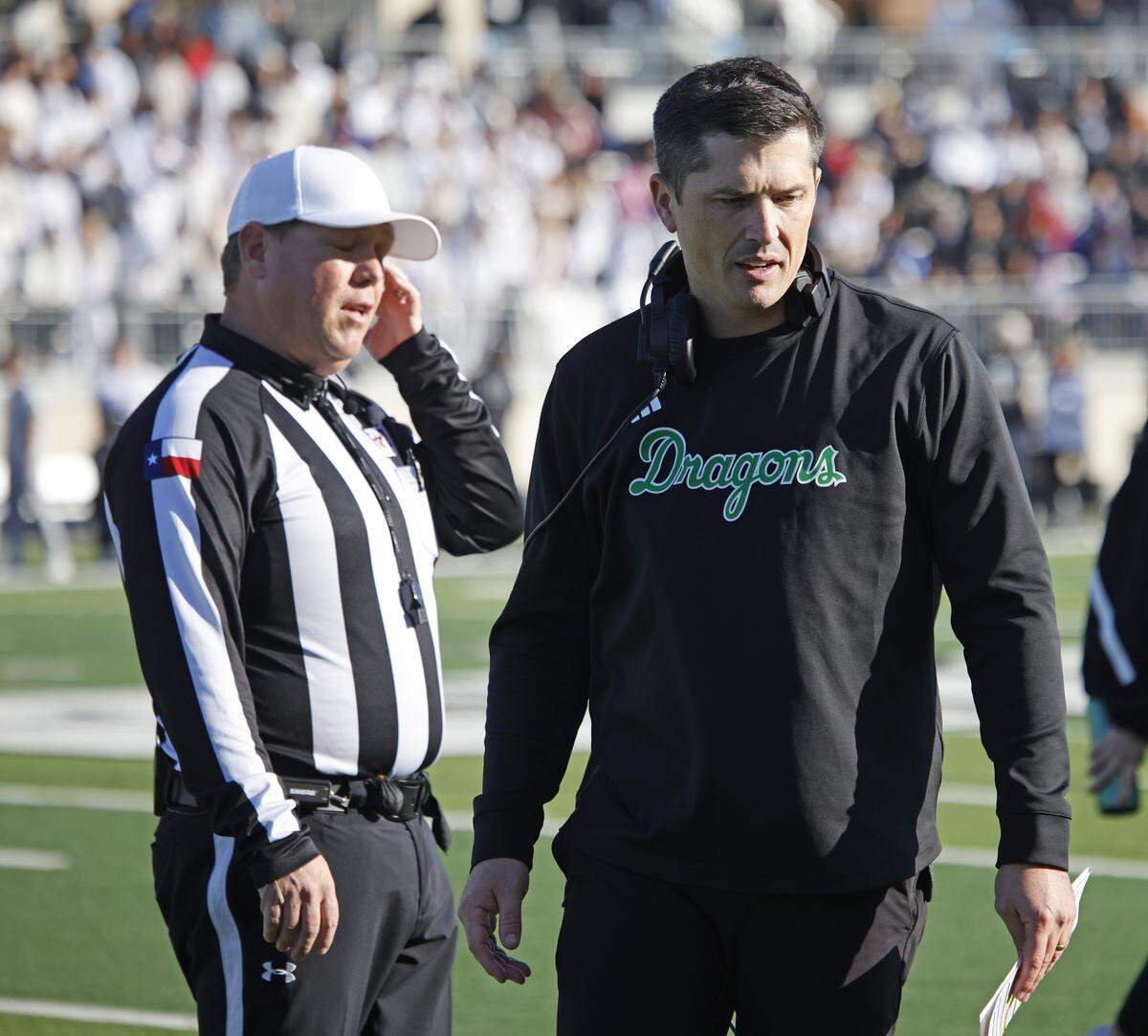 Southlake Carroll head coach Riley Dodge walks off the field after arguing a call with the umpire during the first half of a Class 6A Division II state quarterfinal against Denton Guyer on Dec. 6.