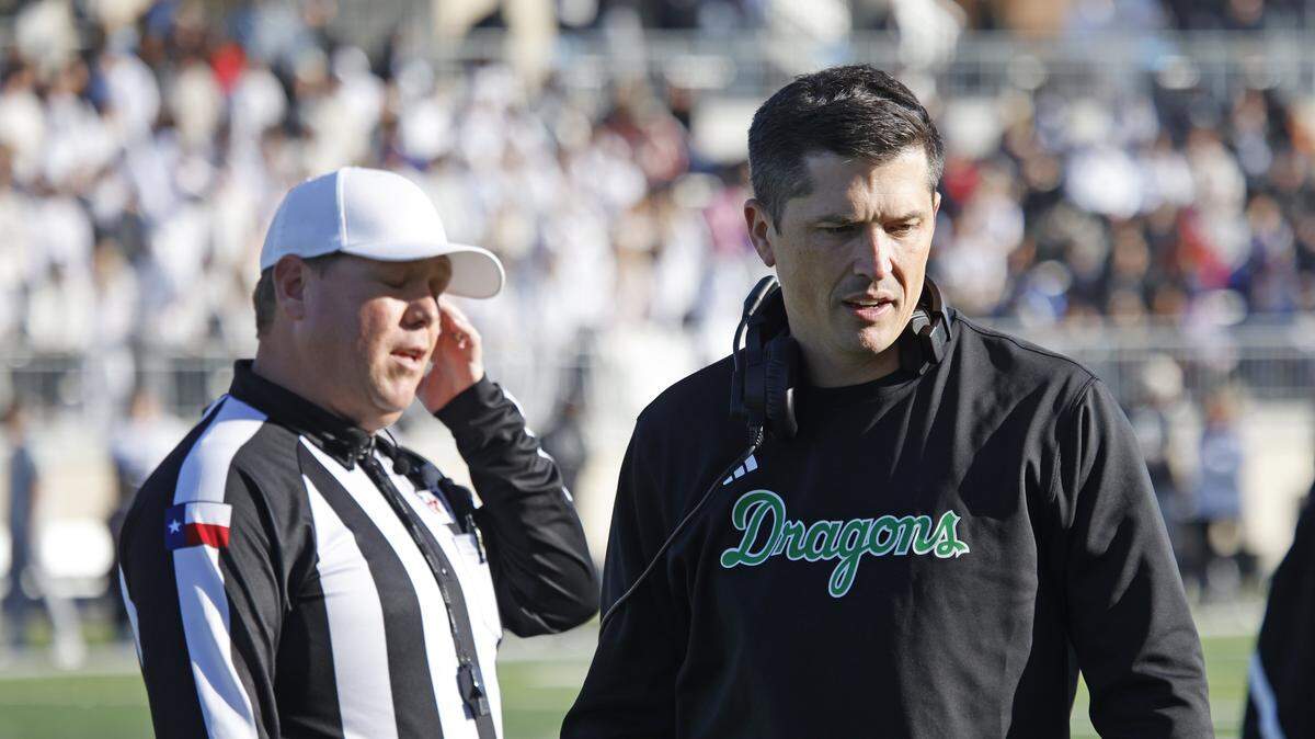 Southlake Carroll head coach Riley Dodge walks off the field after arguing a call with the umpire during the first half of a Class 6A Division II state quarterfinal against Denton Guyer on Dec. 6 at Crowley ISD Multi-Purpose Stadium.