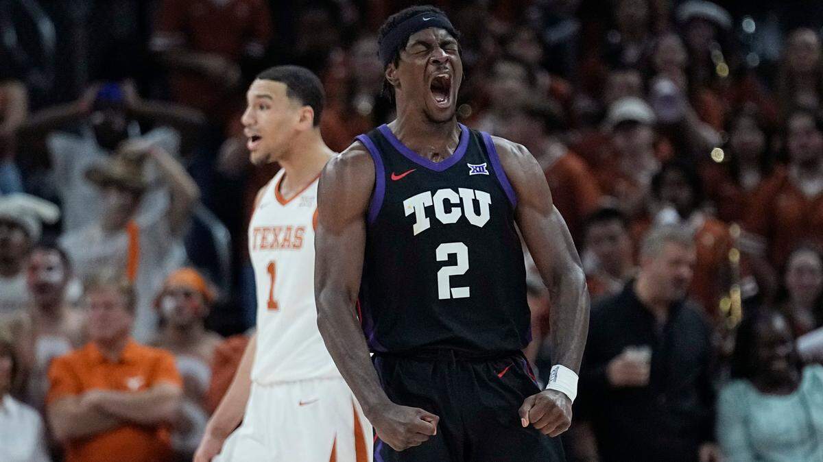 TCU forward Emanuel Miller (2) celebrates a score against Texas during their game in January.