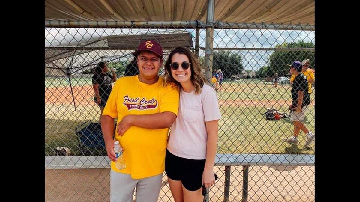 Garrison Christy and Erica Connolly during one of Garrison’s baseball games in 2019. Christy, who is autistic, graduated from Keller Central in 2020 while Connolly met him during a flight from Chicago in 2019.