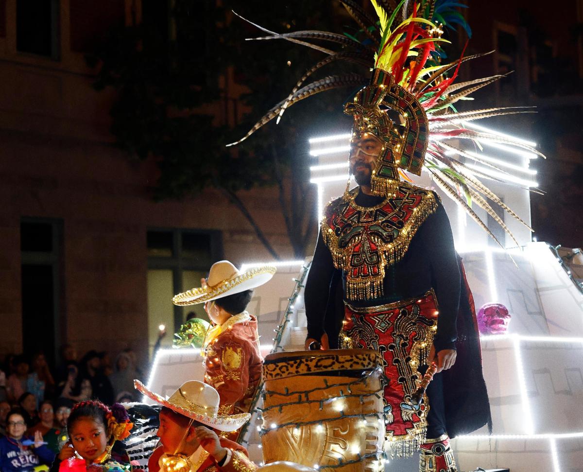 The drummer for Ballet Folklorico Quetzal sounds out a rhythm during the 2023 GM Financial Parade of Lights.