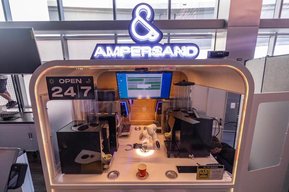 The new Ampersand coffee kiosk features a robotic arm and coffee machines programmed to create multiple different drinks in Terminal C of Dallas Fort Worth International Airport on Wednesday, March 26, 2025.