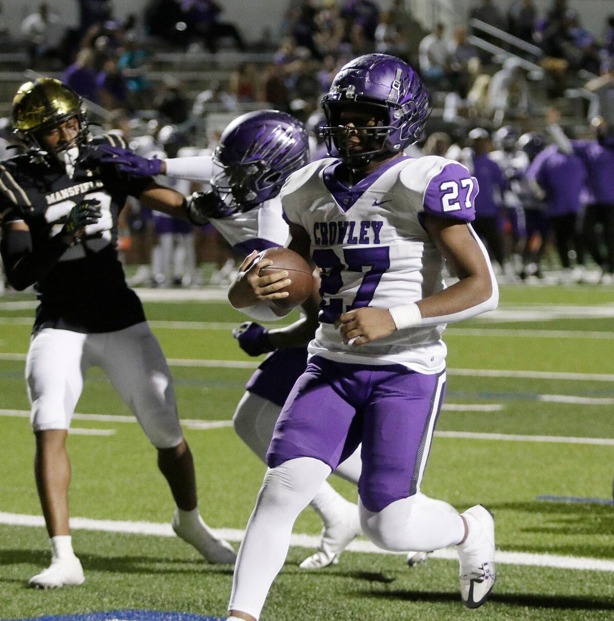 Crowley’s Jonathan Blake scores a touchdown during a UIL football game at Newsome Stadium on Saturday , October 10, 2024.