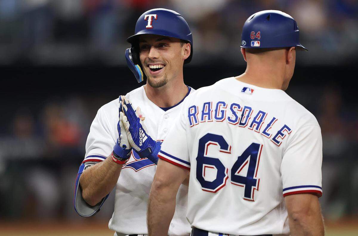 Texas Rangers left fielder Evan Carter reacts after hitting a single in the third inning of Game 4 of the ALCS against the Houston Astros at Globe Life Field in Arlington on Thursday, October 19, 2023.