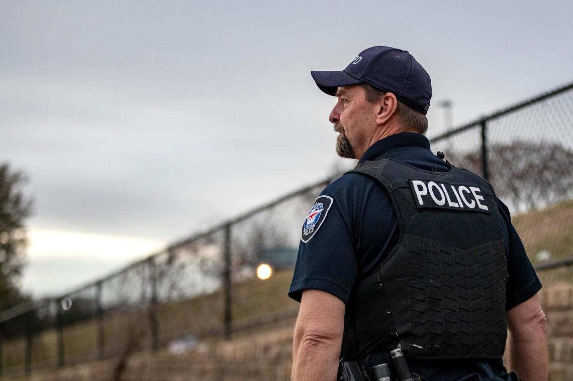 Officer Mike Kuzenka searches nearby for a couple on Jan. 18 to provide them resources and warn them that they’re illegally camping.