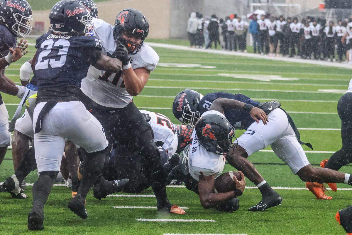 Aledo running back Raycine Guillory, Jr. (1) gets tackled short of the end zone against Denton Ryan in a Class 5A Division 1 state quarterfinal on Saturday, Dec. 7, 2024 at Crowley ISD Multi-Purpose Stadium in Fort Worth, Texas.
