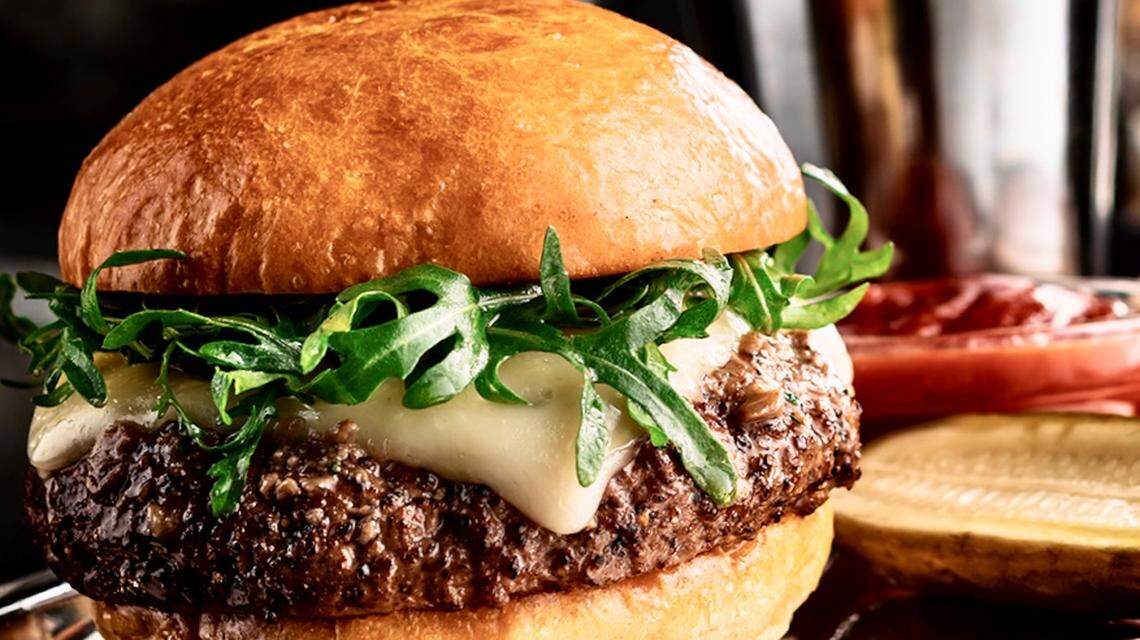 The Del Frisco’s Double Eagle dry-aged brisket-blend burger has Havarti, arugula and porcini-mushroom butter, with Southern-style white mayo-mustard-horseradish “barbecue” sauce.