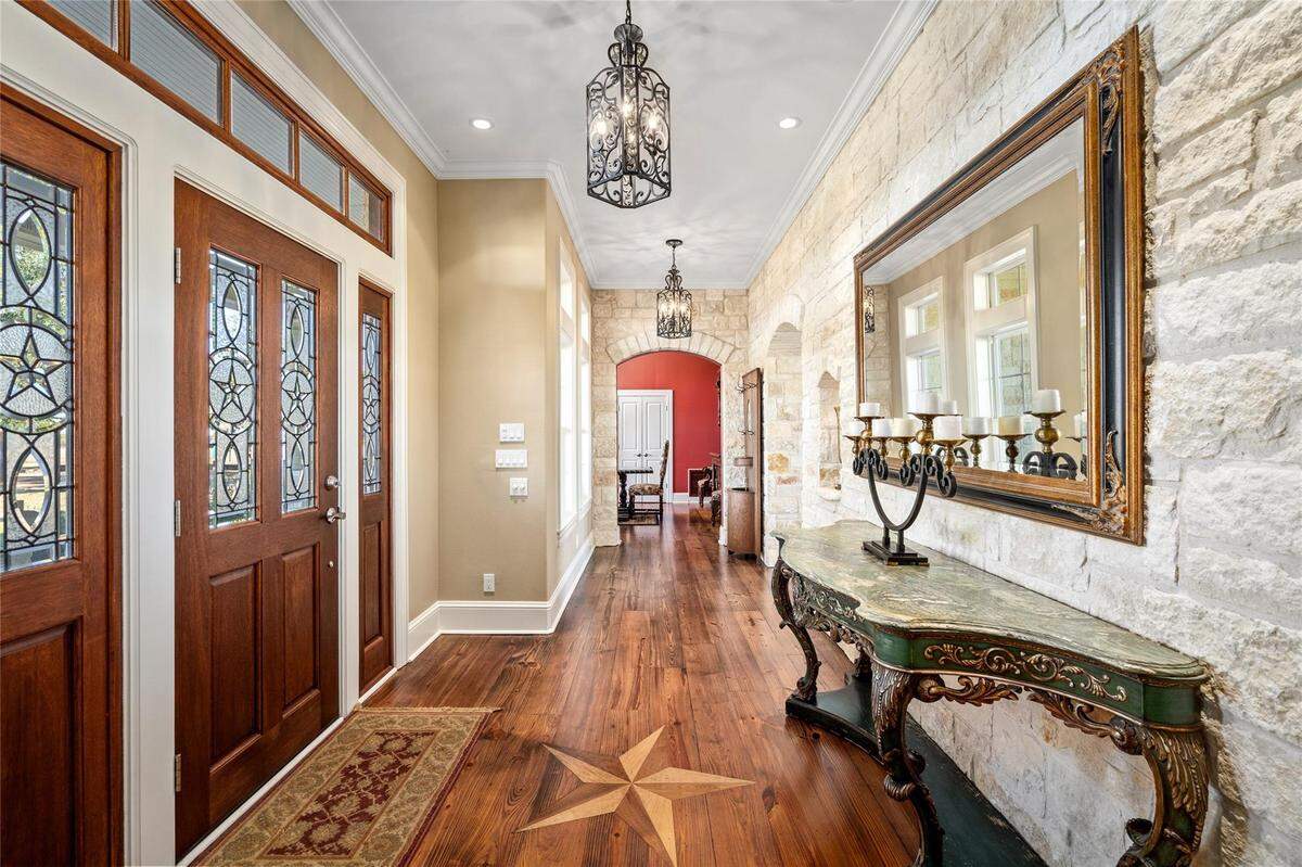 The estate spans 5,694 square feet with four bedrooms and six bathrooms.