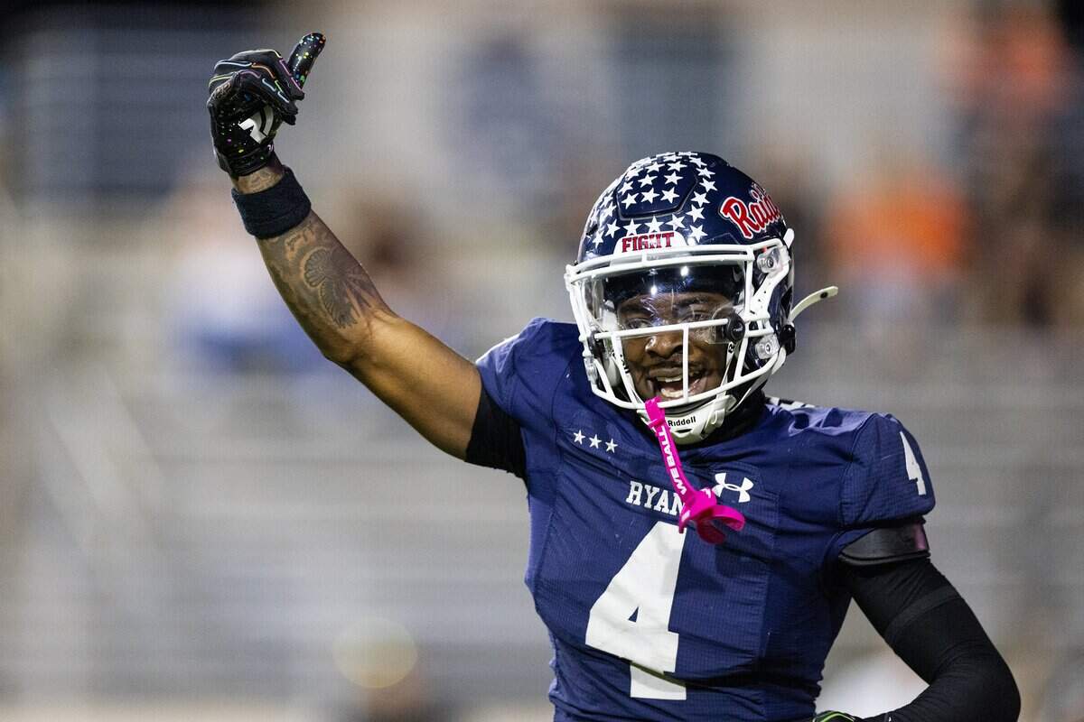 Denton Ryan running back Tre'Vaughn Reynolds (4) celebrates after running the ball in for a touchdown in the first half of a high school football game between the Aledo Bearcats and the Denton Ryan Raiders at C.H. Collins Athletic Complex in Denton on Friday, Oct. 3, 2025.