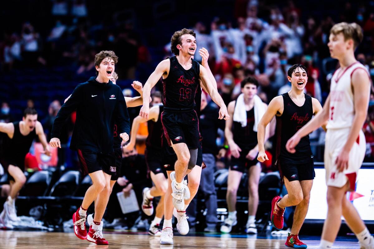 The Argyle Eagles run onto the court in celebration of a 49-30 win over Huffman Hargrave in the 4A state final at the Alamodome in San Antonio Texas, on March 13, 2021. (Photo by Matt Smith. Special to the Star-Telegram).