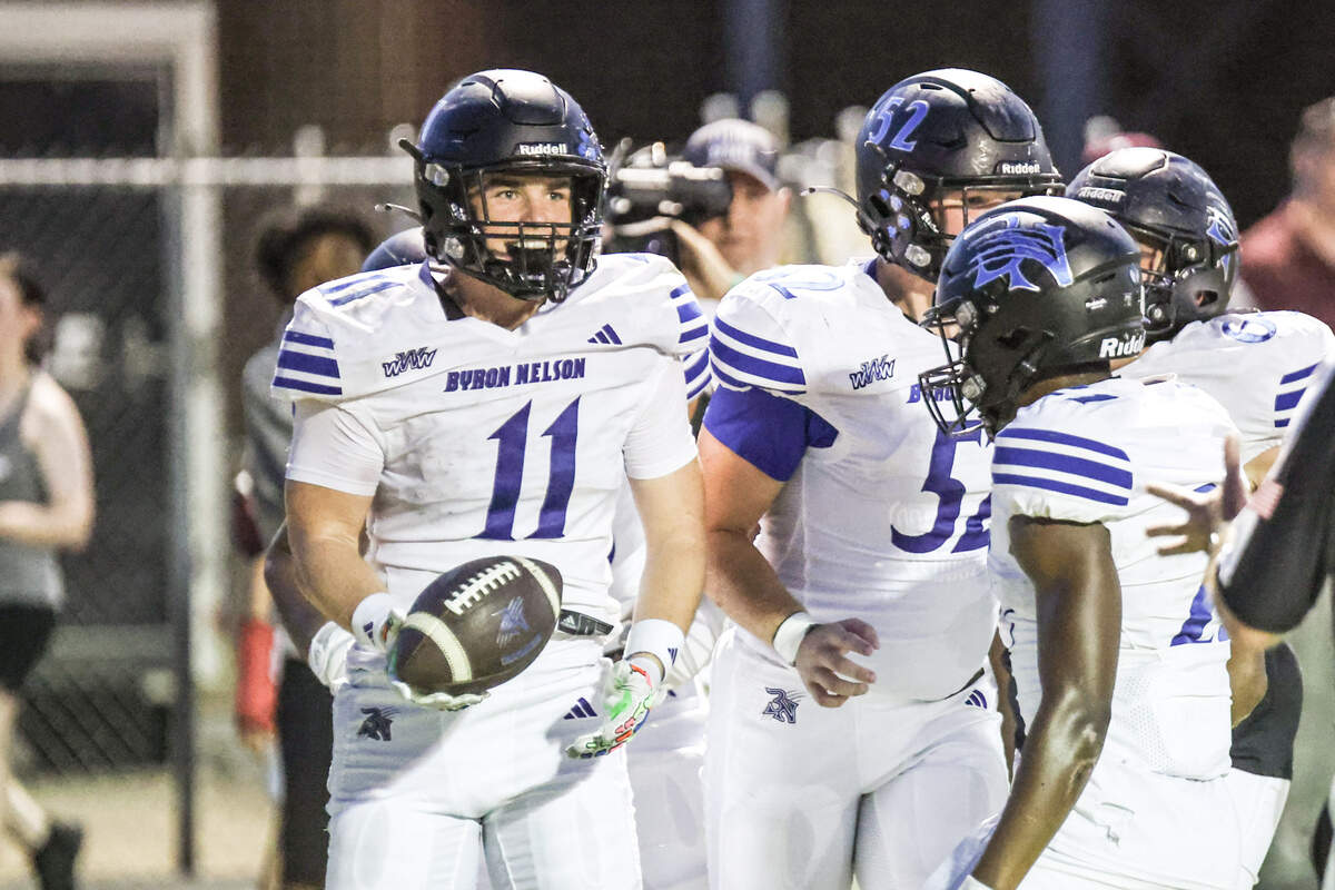 Byron Nelson’s Nolan Hawkins (11) celebrates a touchdown reception late in the second quarter at Max Goldsmith Stadium in Lewisville on Thursday, Sept. 4, 2025.