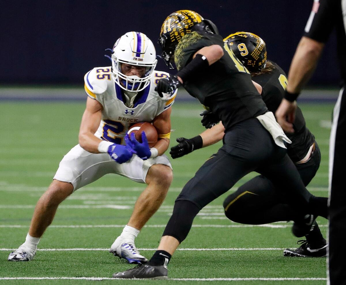 Brock wide receiver Reid Watkins (25) gets out of the backfield in front of Malakoff linebackers Parker Poteete (11) and Matt Stearman (9) in the first half of a UIL Class 3A D1 state semifinal football game at the Ford Center in Frisco, Texas, Thursday, Dec. 08, 2022. Brock led Malakoff 14-3 at the half. (Special to the Star-Telegram Bob Booth)