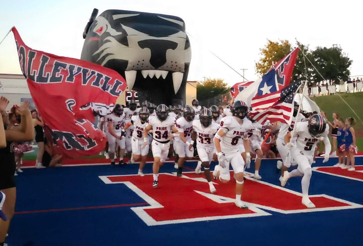 The Colleyville Heritage Panthers take the field before squaring off with Grapevine in the Battle of the Red Rail on Friday, September 29, 2023 at Mustang-Panther Stadium in Grapevine, Texas.