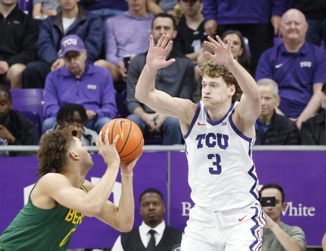 TCU guard Liutauras Lelevicius (3) attempts to block the shot of Baylor guard Dan Skillings Jr. (0) during the first half of a NCAA basketball game between Baylor University and TCU at Schollmaier Arena in Fort Worth, Texas, Saturday Jan. 03, 2026