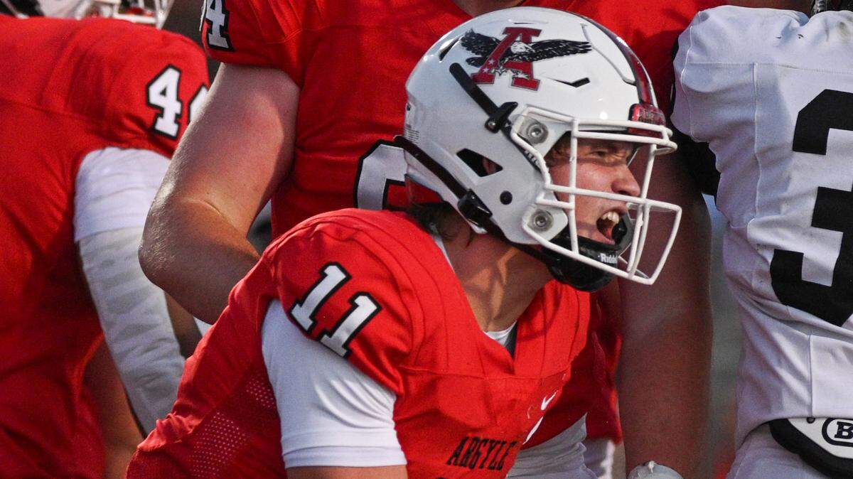 Argyle quarterback Maguire Gasperson (11) celebrates a touchdown during a UIL football game against Colleyville Heritage at Eagle Stadium in Argyle, Texas on Friday, Sept. 27, 2024.
