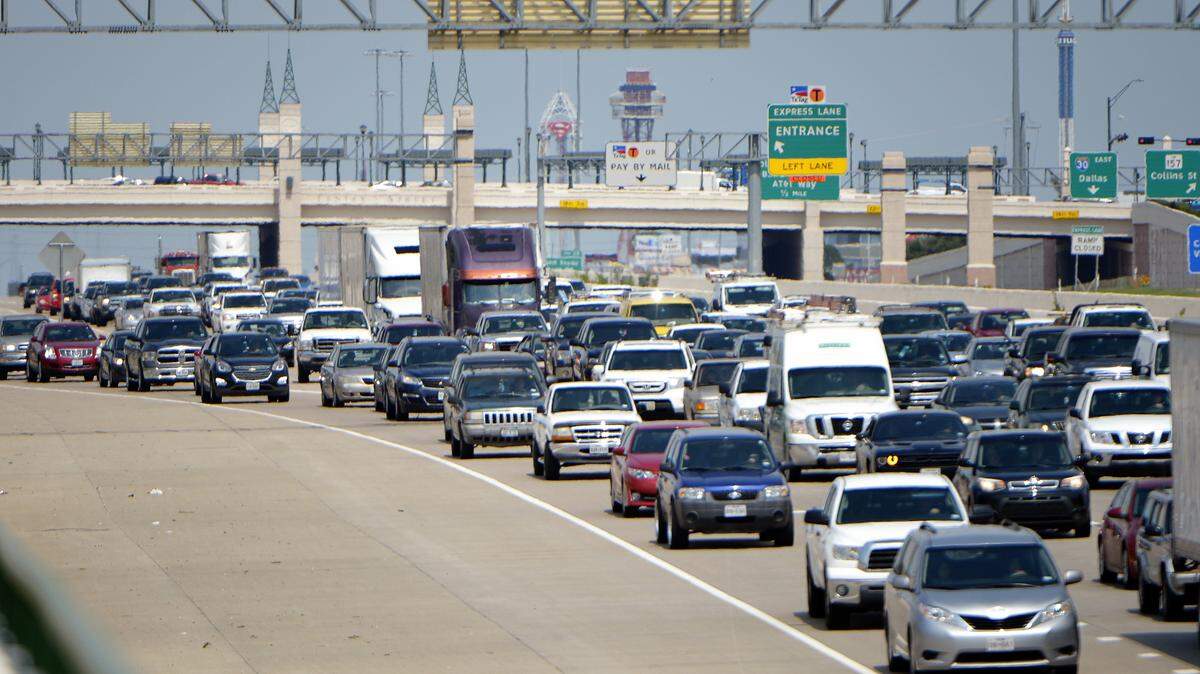 SWAT officers removed a man from a semi-truck that led police on a high-speed chase in Arlington, Texas, Friday, June 9, 2017, leaving I-30 littered with crashed vehicles and shutting down the busy freeway for two hours.