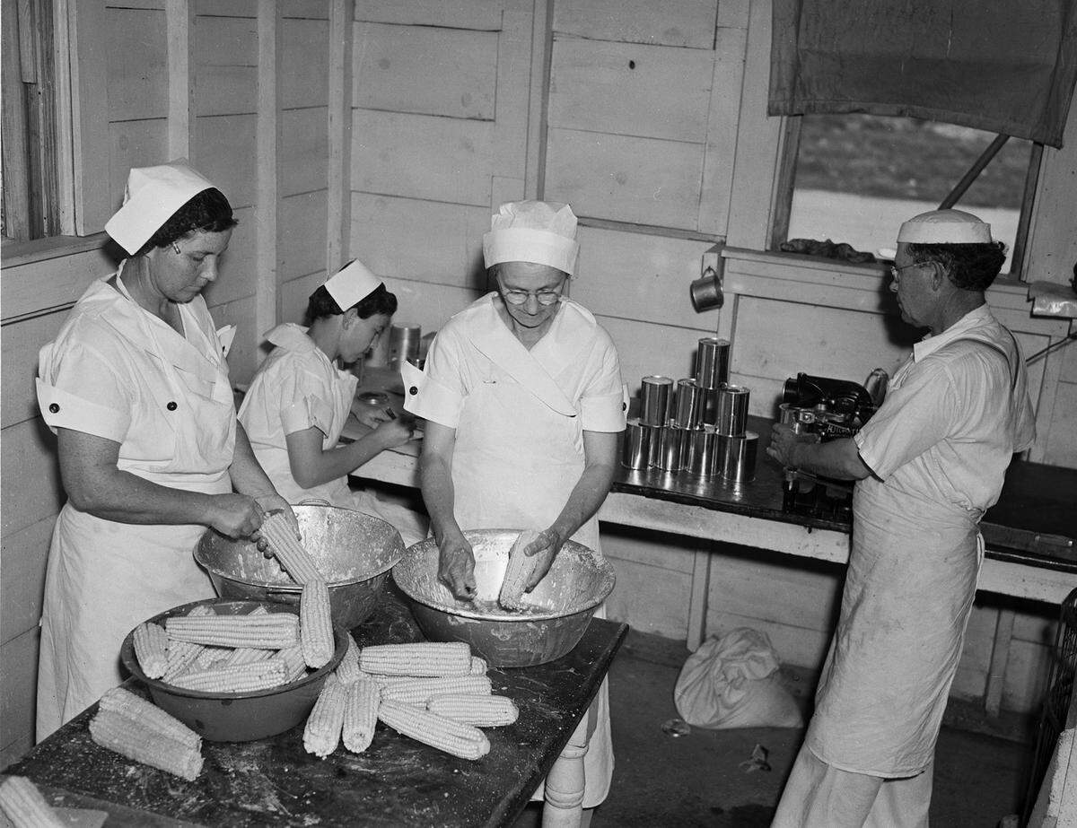 June 1939: Grapevine’s WPA canning plant, which produces thousands of cans of fruit, vegetables and meat. From left, Mrs. A.J. McCord, Mrs. Ruth Long, Mrs. S.D. Coursey and J.W. Barnett