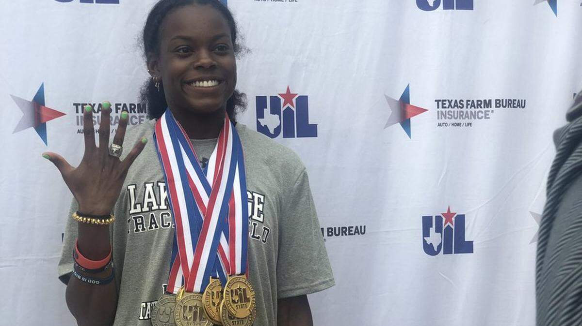 Lake Ridge senior Jasmine Moore after winning her fourth straight UIL state title in both the long jump and triple jump.