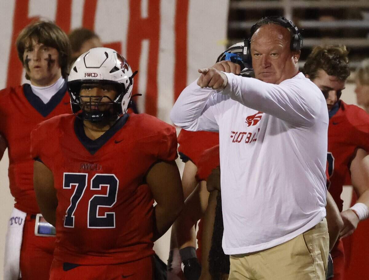 Country Day head coach Keith Burns directs defensive traffic during the first half of the SPC 2025 3A Football Championship football game between The Oakridge School and Fort Worth Country Day at Mavericks Stadium in Arlington, Texas, Saturday Nov. 08, 2025.