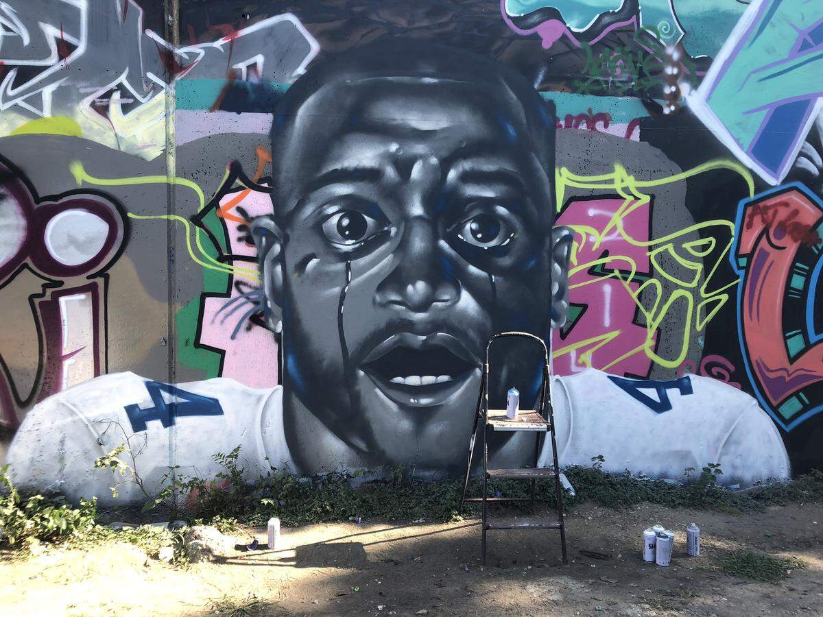 Trey Wilder created a mural in which Cowboys quarterback Dak Prescott portrays an iconic image from Jordan Peele’s award-winning film ‘Get Out.’
