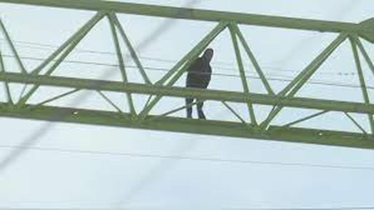 A man possibly was on top of a crane at a construction site in west Dallas for more than 24 hours before he was taken into custody. Police said he faces a charge of criminal mischief.