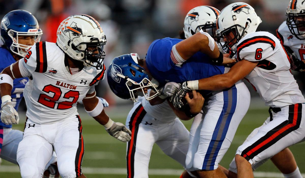 Weatherford’s Ken Seals scrambles on a broken play in the first half against Haltom on Oct. 3, 2019, in Weatherford.