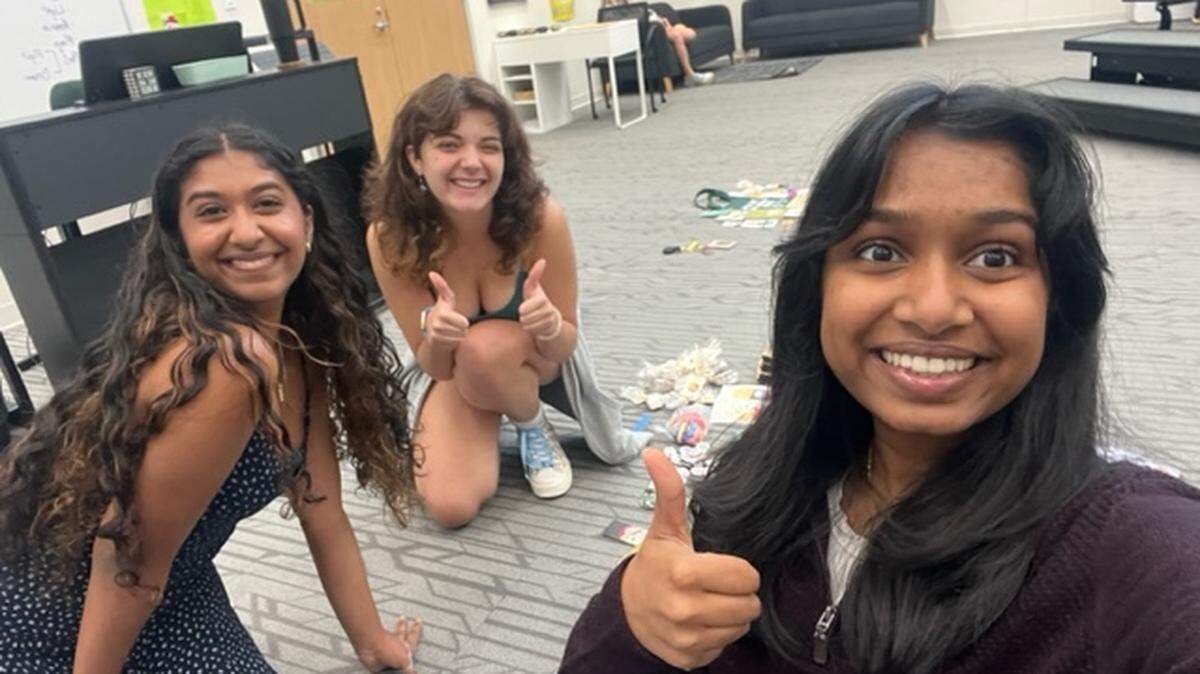 Megha Kadiyala, left, Maddie Riehl and Srishthi Das are members of Carroll High School’s Unlocked Library club, where students can read books that have been challenged or banned.
