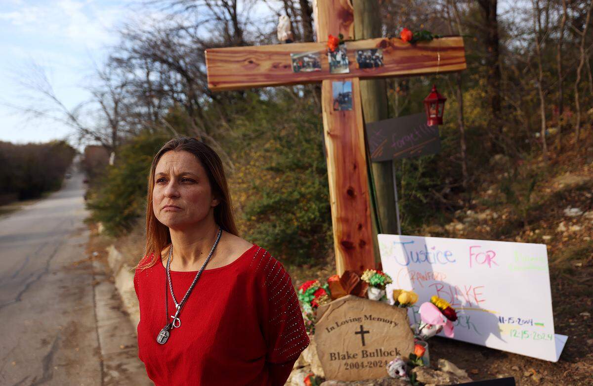 Amy Spurlock is searching for answers about the night her son, Blake Bullock, 20, died over a year ago on Northwest 20th Street in Fort Worth. A large wooden cross marks the area where his body was found lying the street after being struck by a police vehicle responding to a report of gunfire.