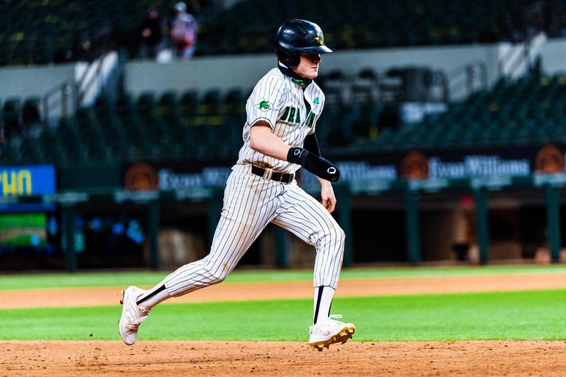 Tyson Drake (4) runs towards third base during a game between Carroll and Prosper at Globe Life Field in Arlington during the High School Baseball Showcase on February 28, 2021. Photo by Matt Smith. (Special to the Star-Telegram).