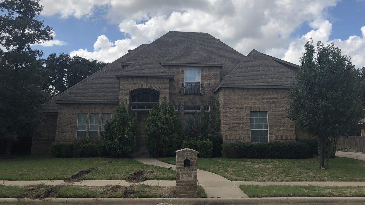 The house at 12405 Yellow Wood Dr. was found to be one of three homes that housed a sex trafficking ring in north Texas, according to the Dallas Police Department.
