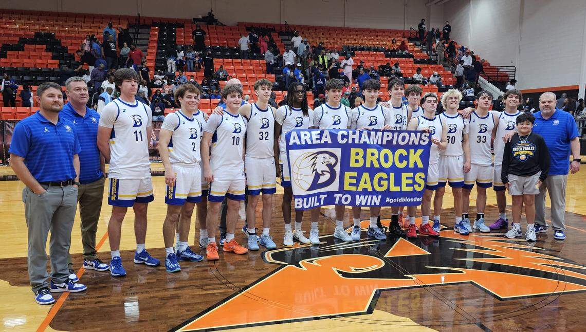 The Brock boys basketball team poses after defeating Fort Worth Dunbar 67-38 in a Class 4A Division II area-round playoff game on Thursday, February 26, 2026 at Aledo High School in Aledo, Texas.