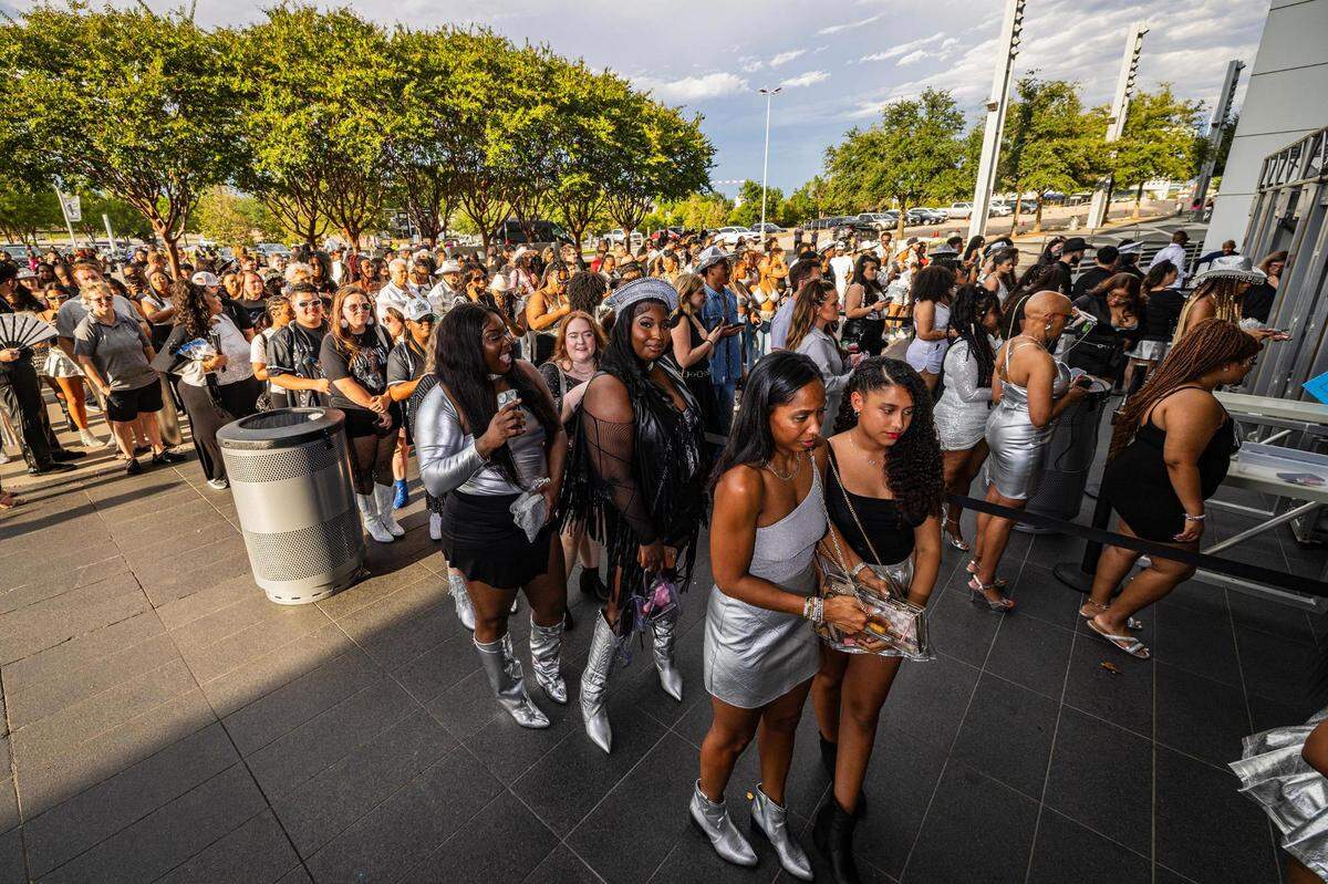 Fans begin to line up before entering Beyonce’s Renaissance World Tour at AT&T Stadium in Arlington on Thursday, Sept. 21, 2023.