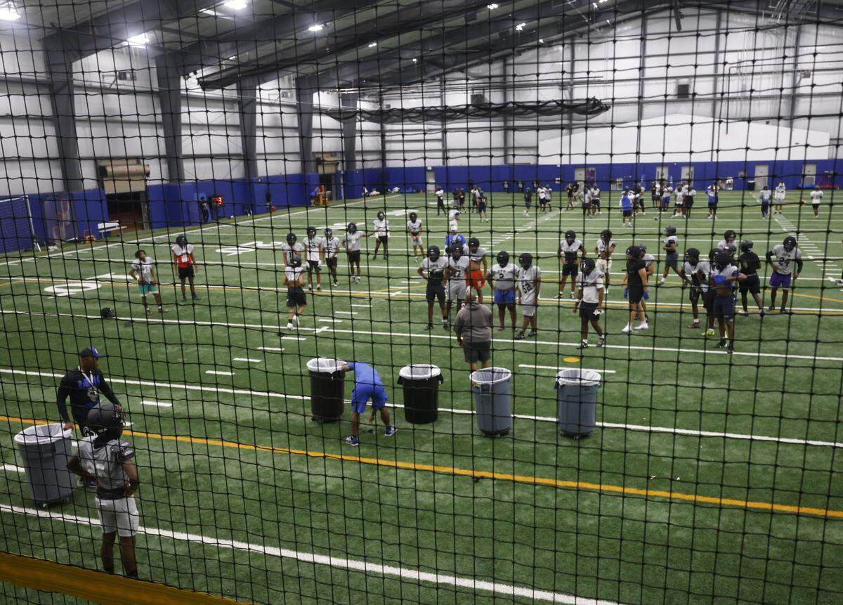 The North Crowley Panthers work inside their practice facility during their first practice for the 2025 season Thursday.