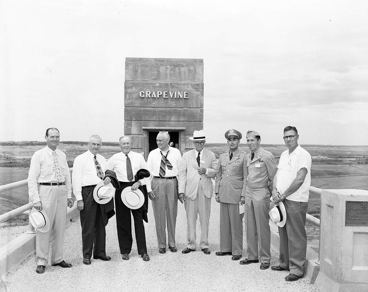 July 3, 1952: At Grapvine Dam, left to right, George Bennett, Fort Worth; R.C. Coffee of University Park; C.C. English, Dallas; J. B. Adoue Jr. of Dallas; John W. Carpenter of Dallas; Col. Herbert D. Vogel of Dallas; H. R. Hallock of Fort Worth and Gordon Tate of Grapevine.