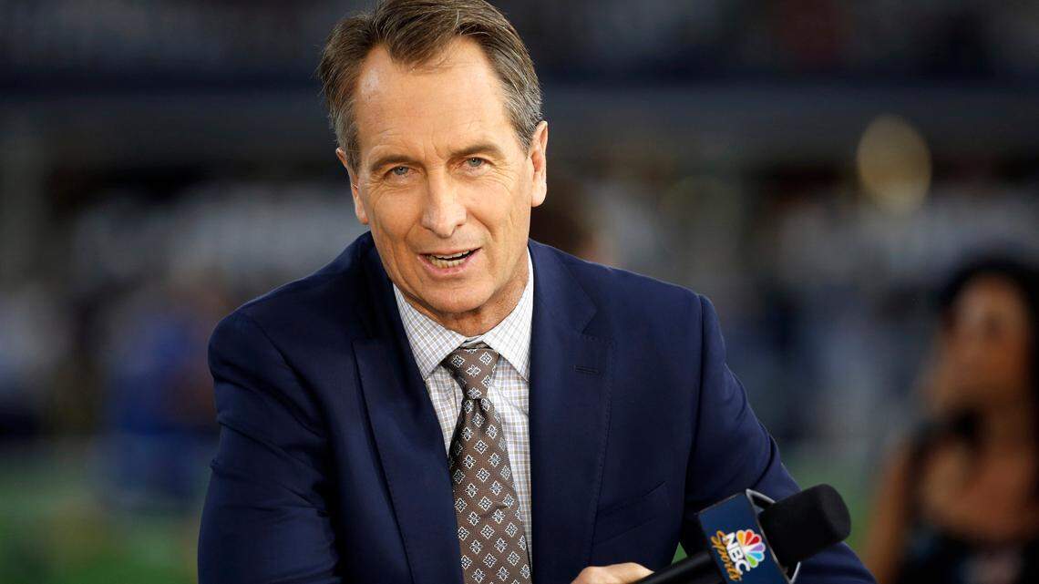 In this Oct. 30, 2016, file photo, NBC Sunday Night Football cast member Cris Collinsworth sits on the set during pregame of an NFL game. Collinsworth sounded extremely hoarse during Sunday night’s broadcast of the Dallas Cowboys vs. Tampa Bay Buccaneers game.