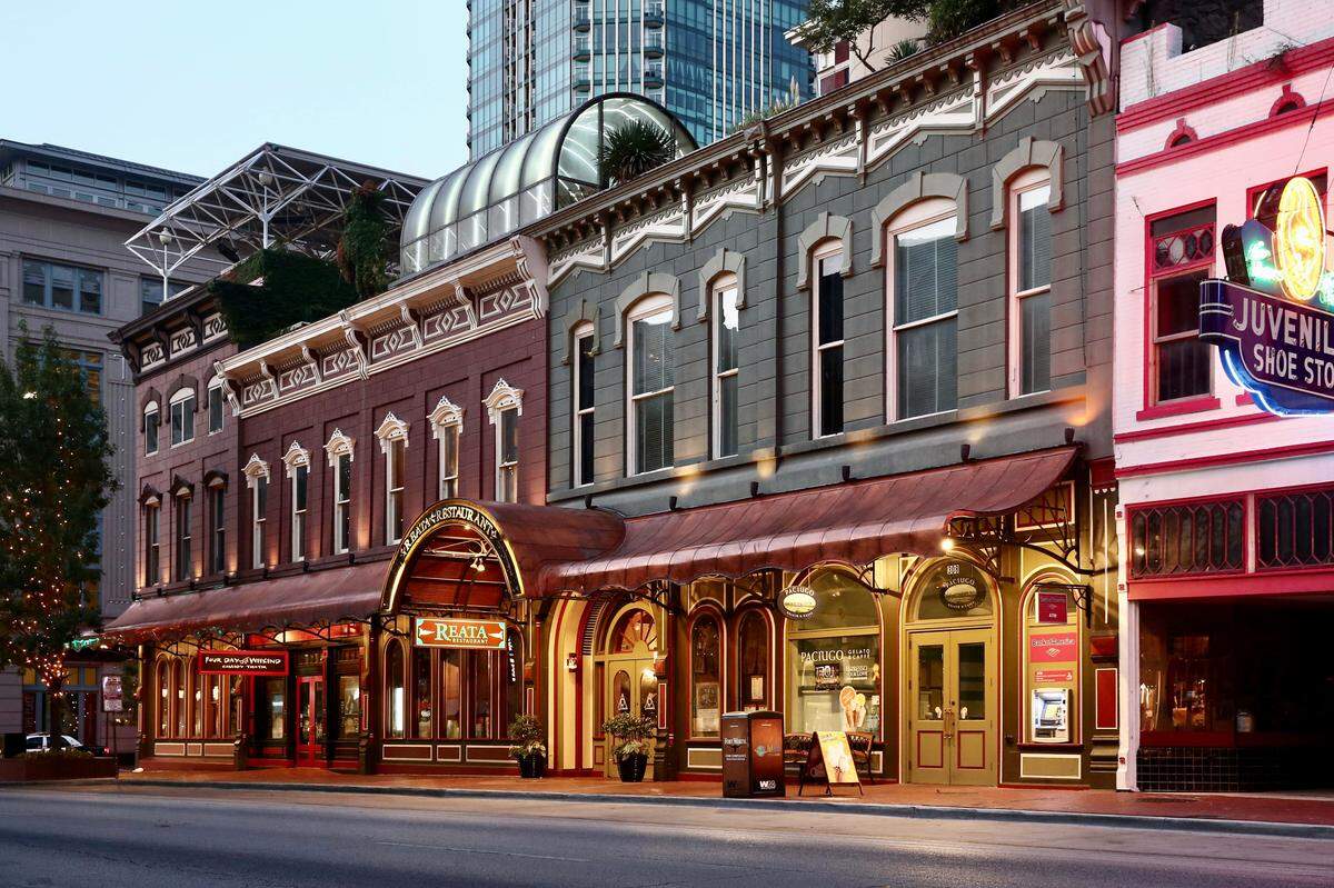 Reata is in a historic Sundance Square building with a rooftop dome and patio. Melt Ice Creams is next door.