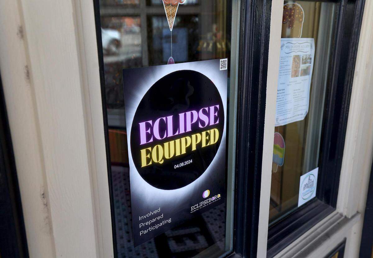 A sign advertises that a shop is ‘Eclipse Equipped’ in downtown Hillsboro on Thursday, February 22, 2024. Hillsboro has been identified as one of the top spots to see the upcoming total solar eclipse.
