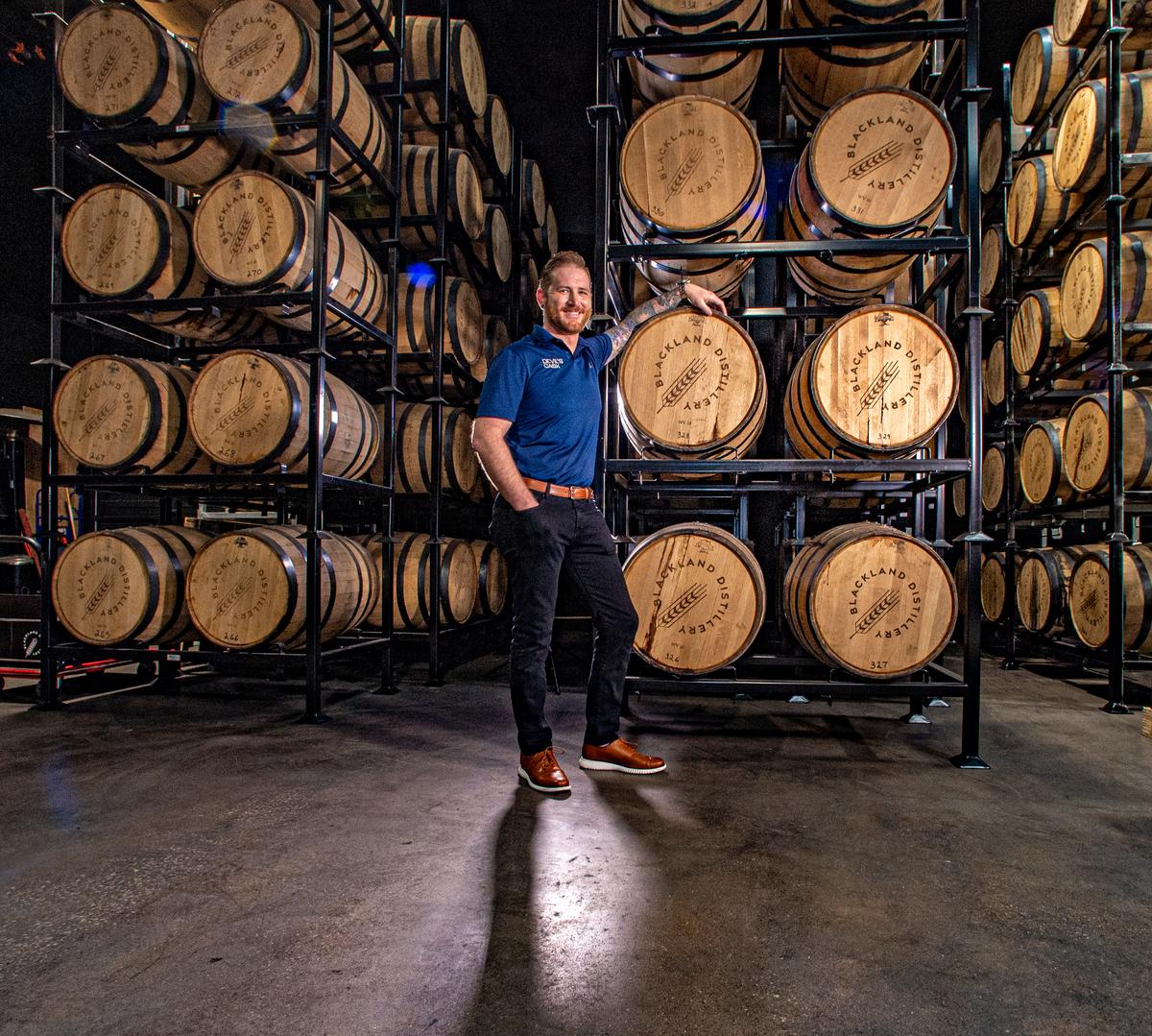 Chase Ament, chief operating officer of Fort Worth-based Devil’s Cask, at Blackland Distillery where they are doing tests on their new technology. Photo taken Monday, Feb. 6, 2023.