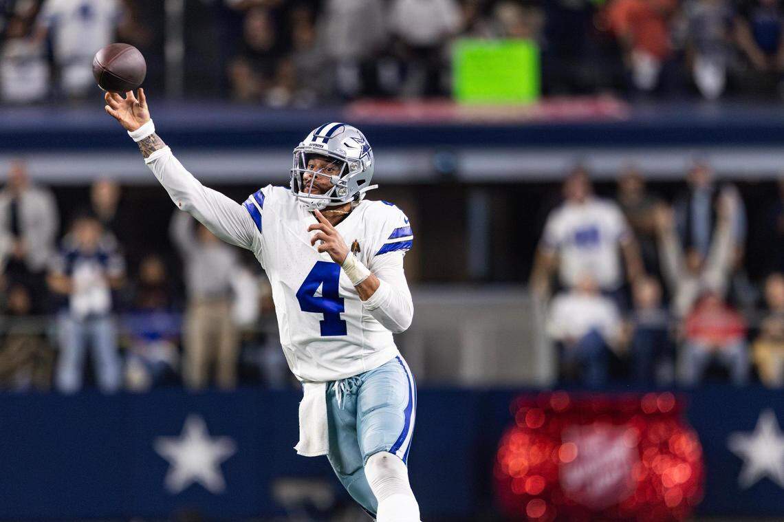 Cowboys quarterback Dan Prescott (4) throws a pass on the run in the third quarter of an NFL game between the Dallas Cowboys and the Seattle Seahawks at AT&T Stadium in Arlington on Thursday, Nov. 30, 2023. The Cowboys came out on top 41-35.