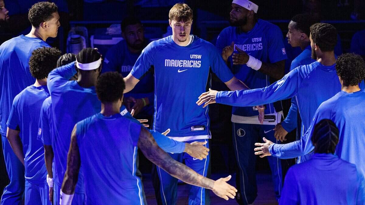 Mavericks forward Cooper Flagg (32) is introduced prior to the first half of a preseason NBA game between the Dallas Mavericks and Oklahoma City Thunder at Dickies Arena in Fort Worth on Monday, Oct. 6, 2025.
