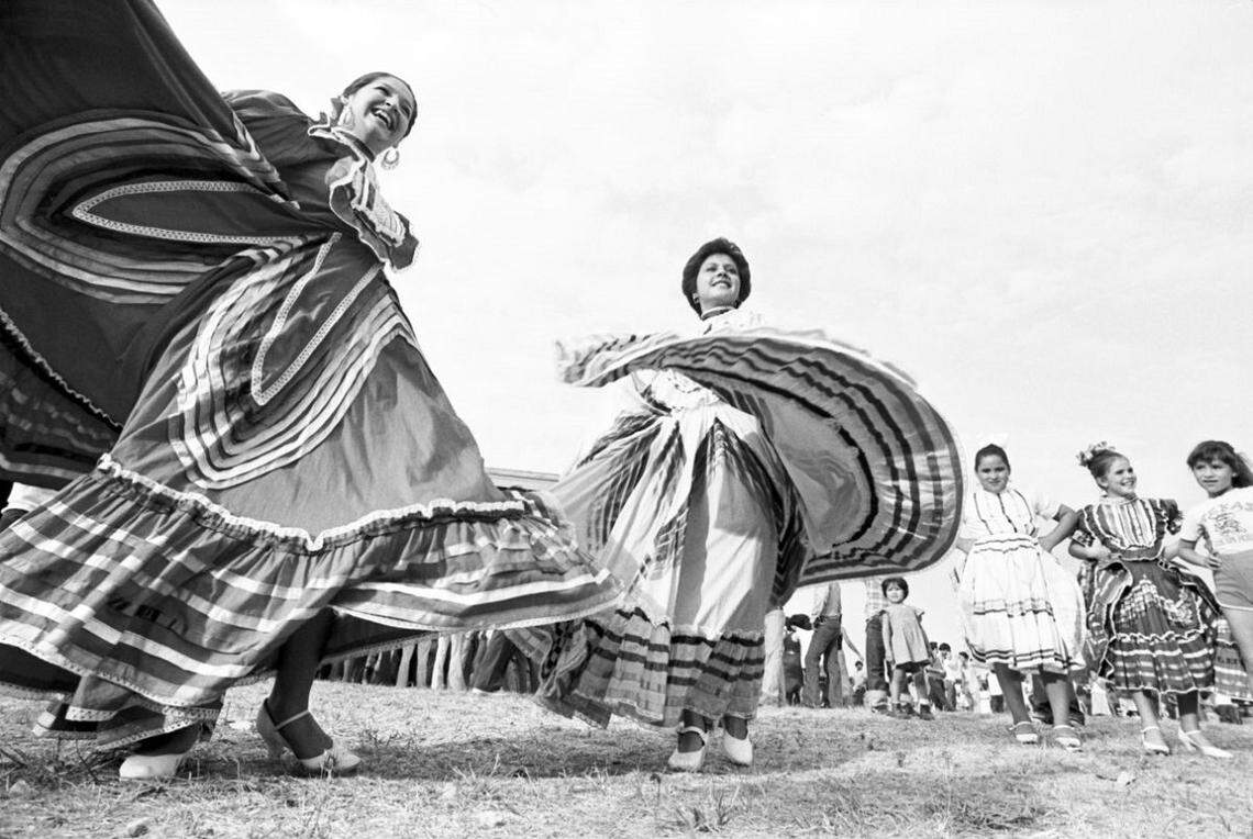 Sept. 13, 1982:  Carol Morales, right, and Jackie Valenciano of Ballet Folklorico Azteca of Fort Worth rehearse a dance routine for Mexican Independence Day festivities at Echo Lake Park. The younger dancers at right are Mindy Gutierrez, third from right, and Melodi Tedford Rodriguez, second from right.