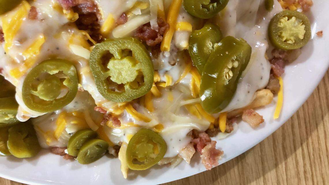 The “Works” at the Prickly Pear is a large chicken-fried steak topped with jalapeno cheese fries.