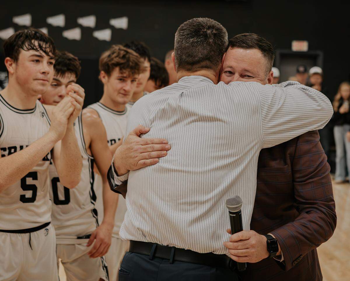 Graford head coach Jeff Bell hugs assistant coach Steven Stegall after they beat the De Leon Bearcats 90-34 on Friday, Dec. 20, 2024 for Bell’s 1,000th career win. (Photo courtesy of: Jordan Bell)