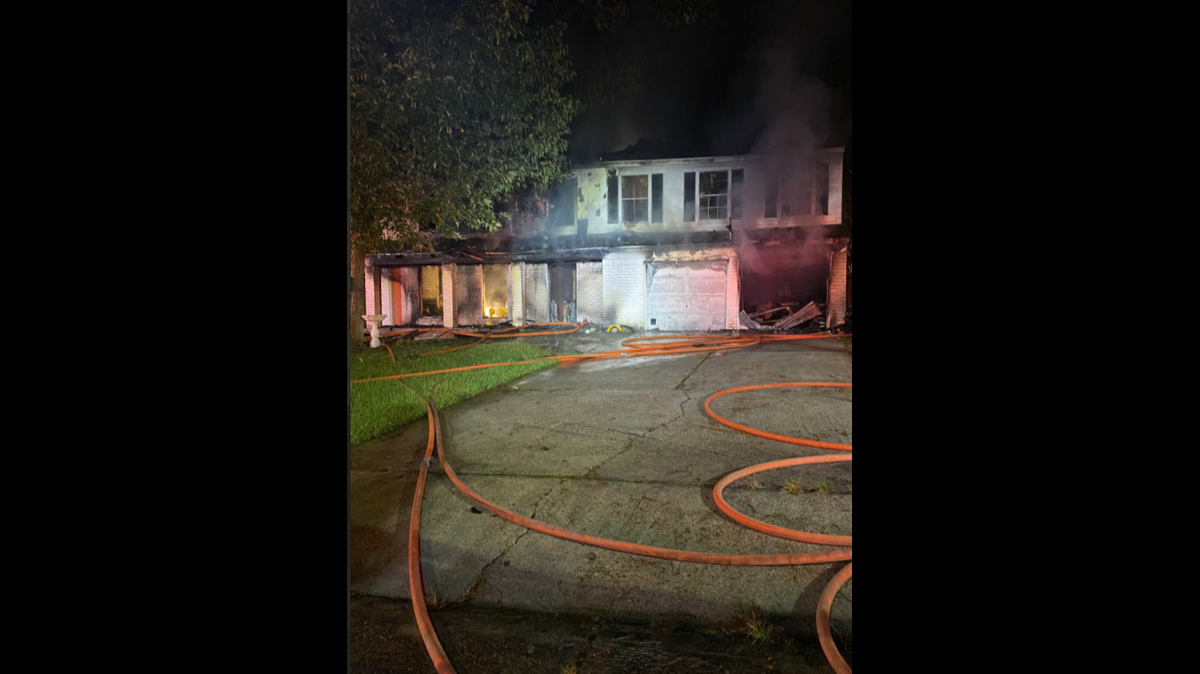 Police in Texas say a woman doused a man in flammable liquid inside a Houston-area home and set him ablaze, causing a house fire and injuring another woman in the process.