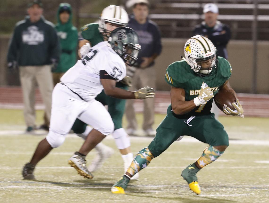Benbrook running back Quintan Jackson breaks away from Kennedale defensive tackle Jordan Price (52) in the first half of a high school football game at Clark Stadium in Fort Worth, Texas, Thursday, Nov. 01, 2018. Kennedale led 29-7 at the half. (Special to the Star-Telegram Bob Booth)