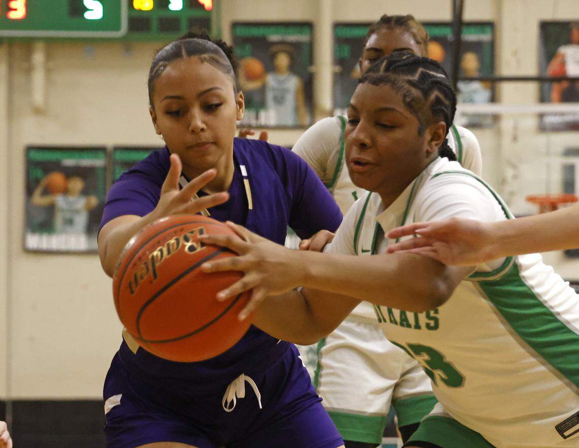 Kennedale forward Ciara Taylor (23) grabs a loose ball in front of Alvarado center Victoria Dixon (10) during the second half of a UIL girls basketball game between Alvarado and Kennedale at Kennedale High School in Kennedale, Texas, Tuesday Jan. 13, 2026