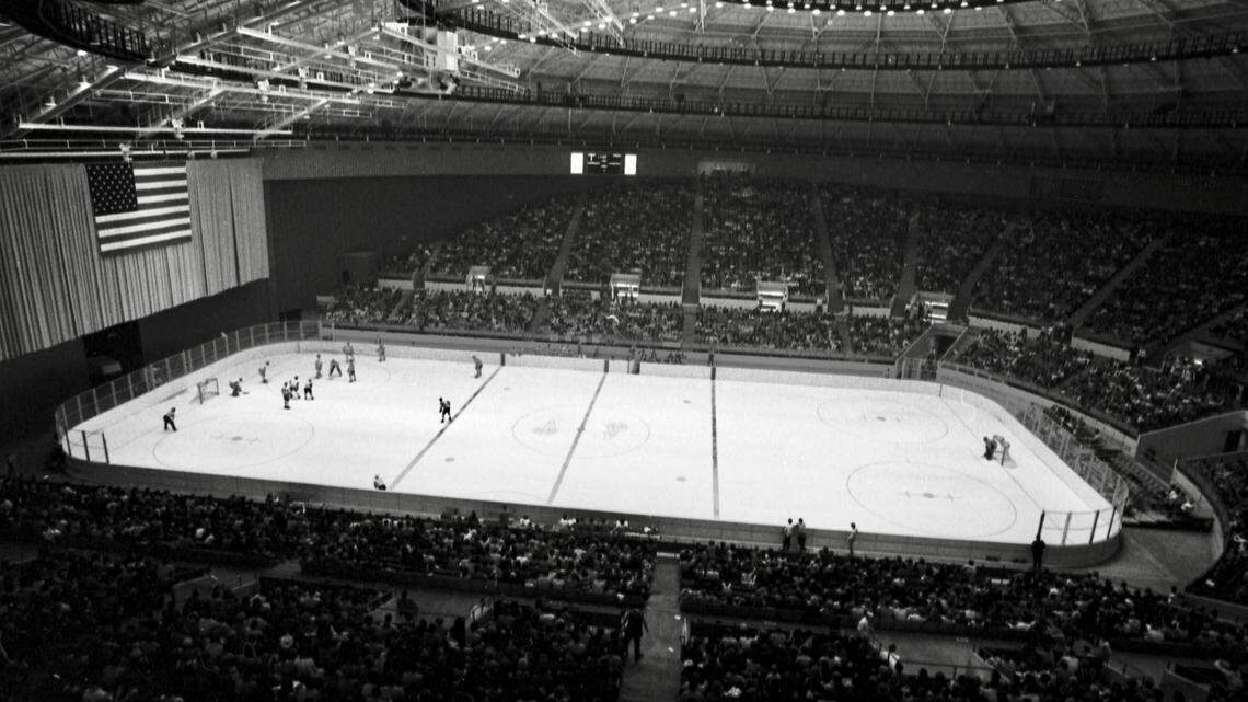 Record crowd of 10,107 at Tarrant County Convention Center for ice hockey game between Fort Worth Wings and Dallas Black Hawks, 02/02/1971 [FWST photographer Al Panzera]