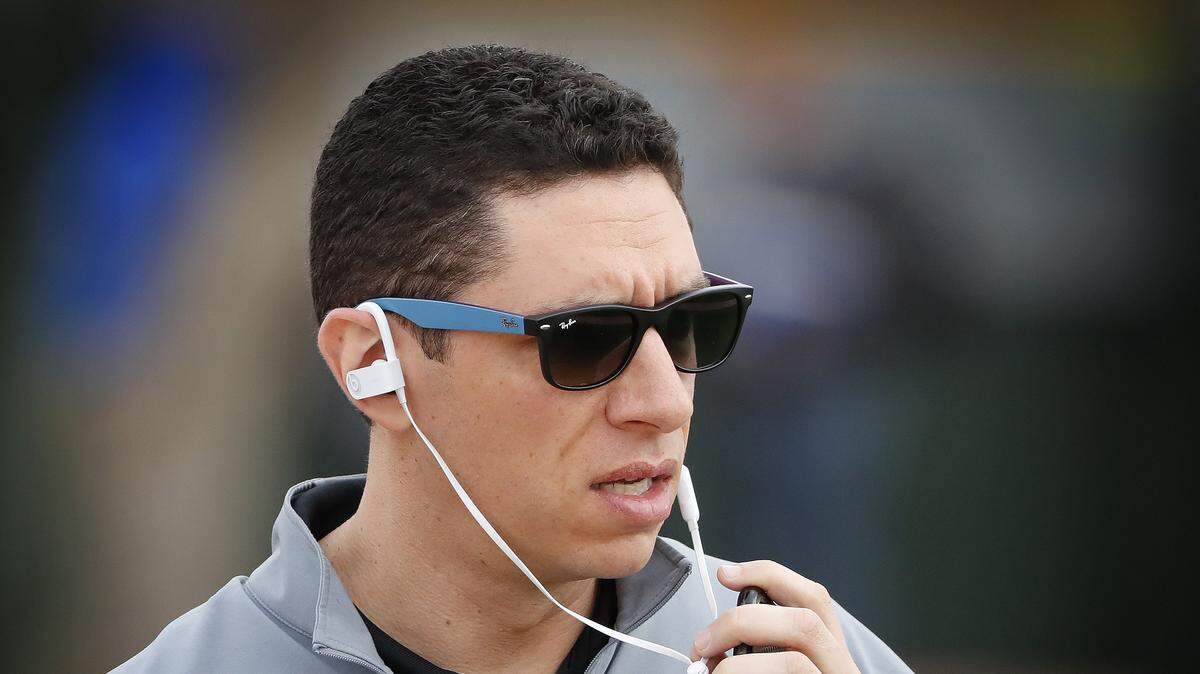 Jon Daniels (Rangers President of Baseball Operations and General Manager) taking a call on the practice fields as the Texas Rangers start their 2018 season on their first day of spring training (for pitchers and catchers), Thursday, February 15, in Surprise, Arizona.